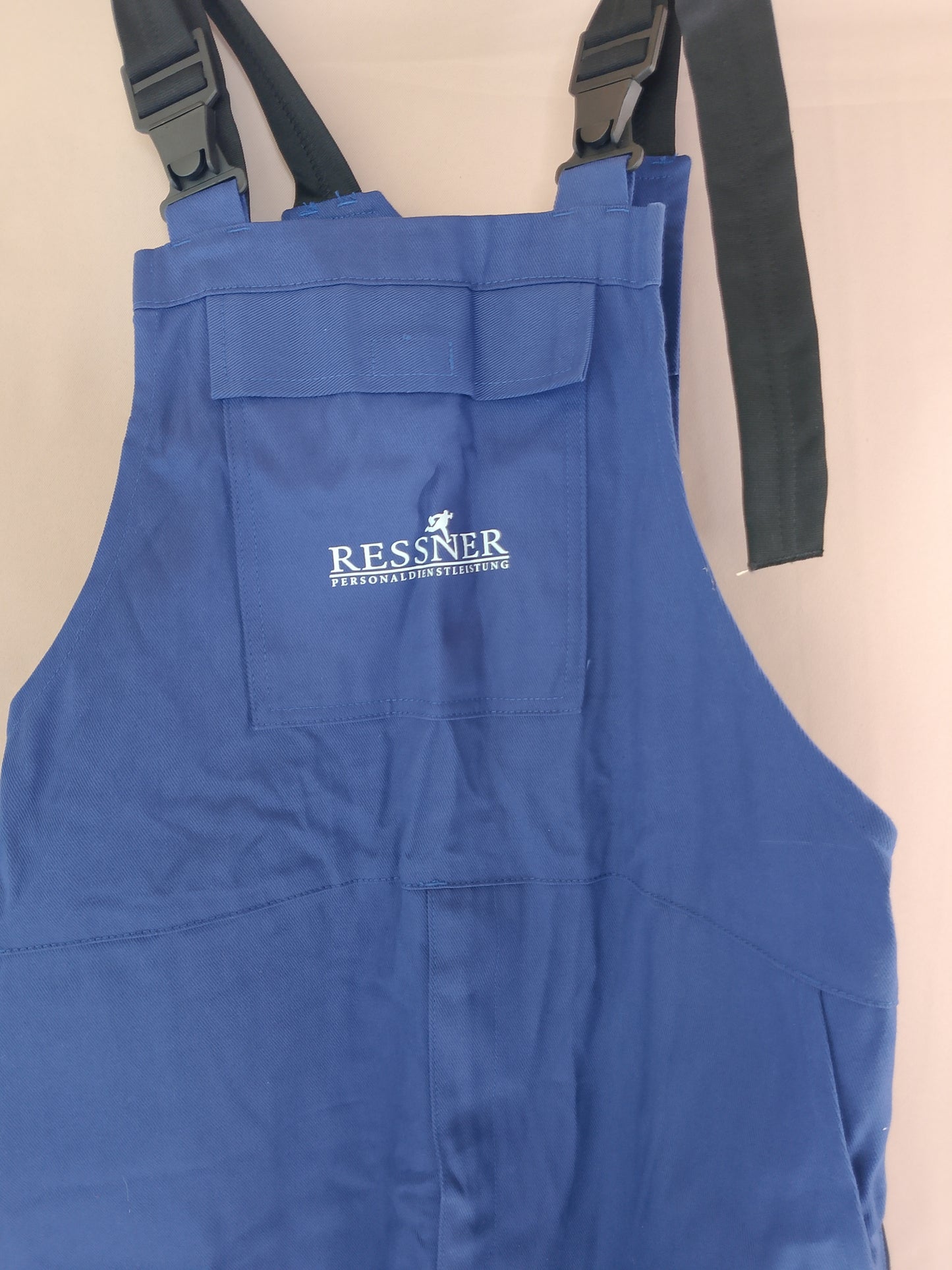 Salopetă de lucru cu bretele RESSNER WORKWEAR - Rezistență, funcționalitate și durabilitate!