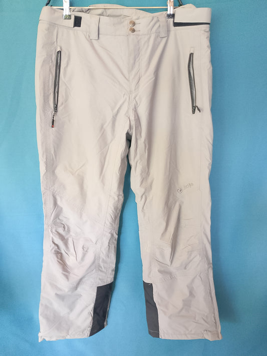 Pantaloni de schi bej, tehnici și rezistenți, ideali pentru performanțe pe pârtie. Marimea XXL.